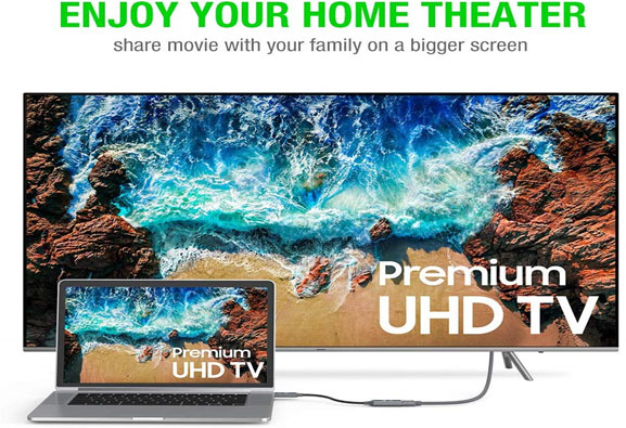  A MacBook connected to a large format flat panel TV, both showing same image of sea waves washing beach, with texts reading as “Premium UHD TV” at the bottom-right part of the screen images  